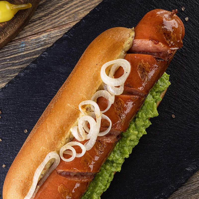 Hot Dog con cebollas al asador