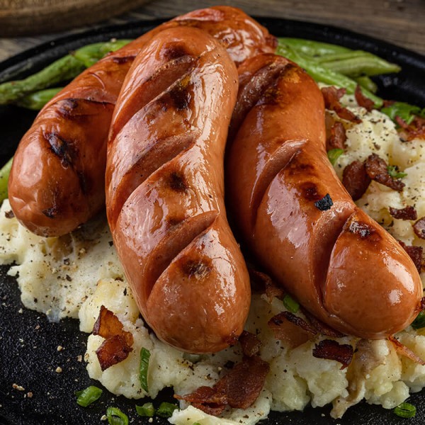 Salchichas rosten wurst asadas servidas con pure de papa